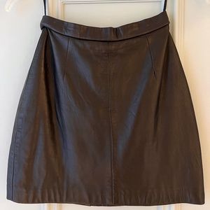 Tiny black leather mini skirt